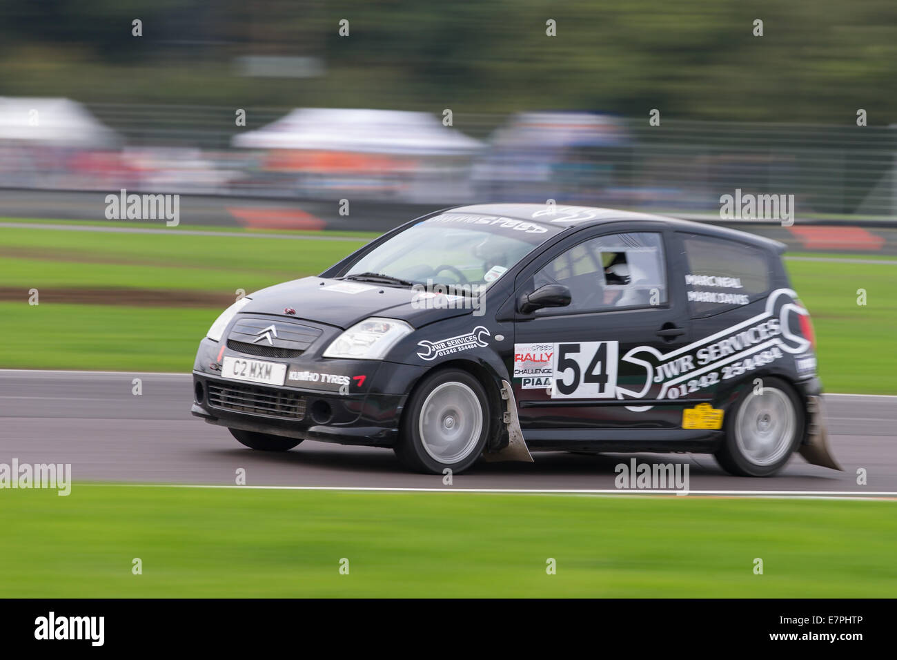 A rally car takes to the track at Rallyday at Castle Combe Stock Photo ...