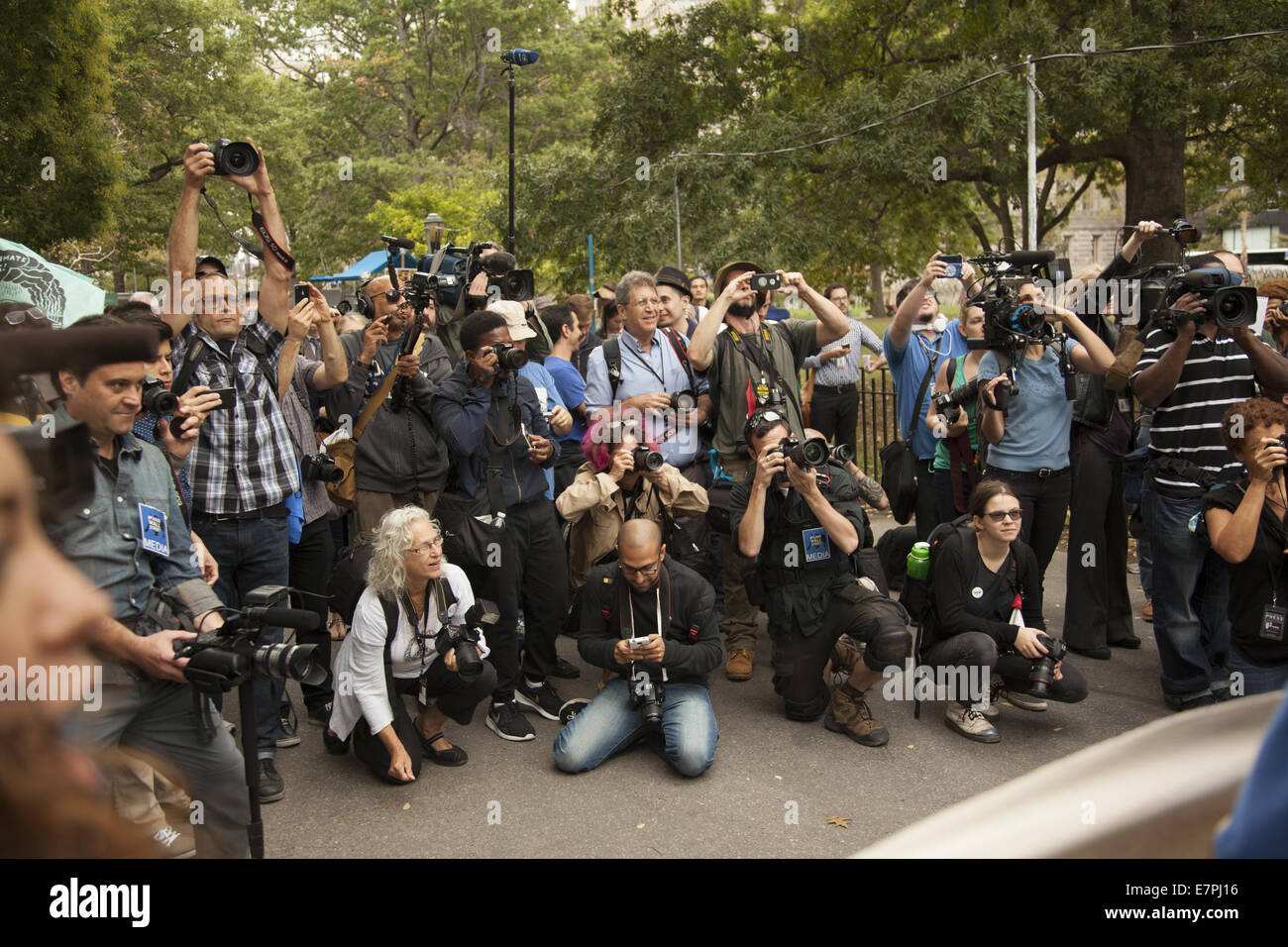 New York, USA. 22nd Sept. 2014. Climate Justice was the watch word today as protesters staged a sit-in in NYC's Financial District to protest against the criminality of 'Wall Street' in supporting corporations that are destroying the planet. Credit:  David Grossman/Alamy Live News Stock Photo