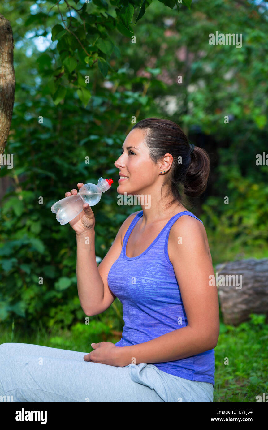 Little girl drinks water Stock Photo