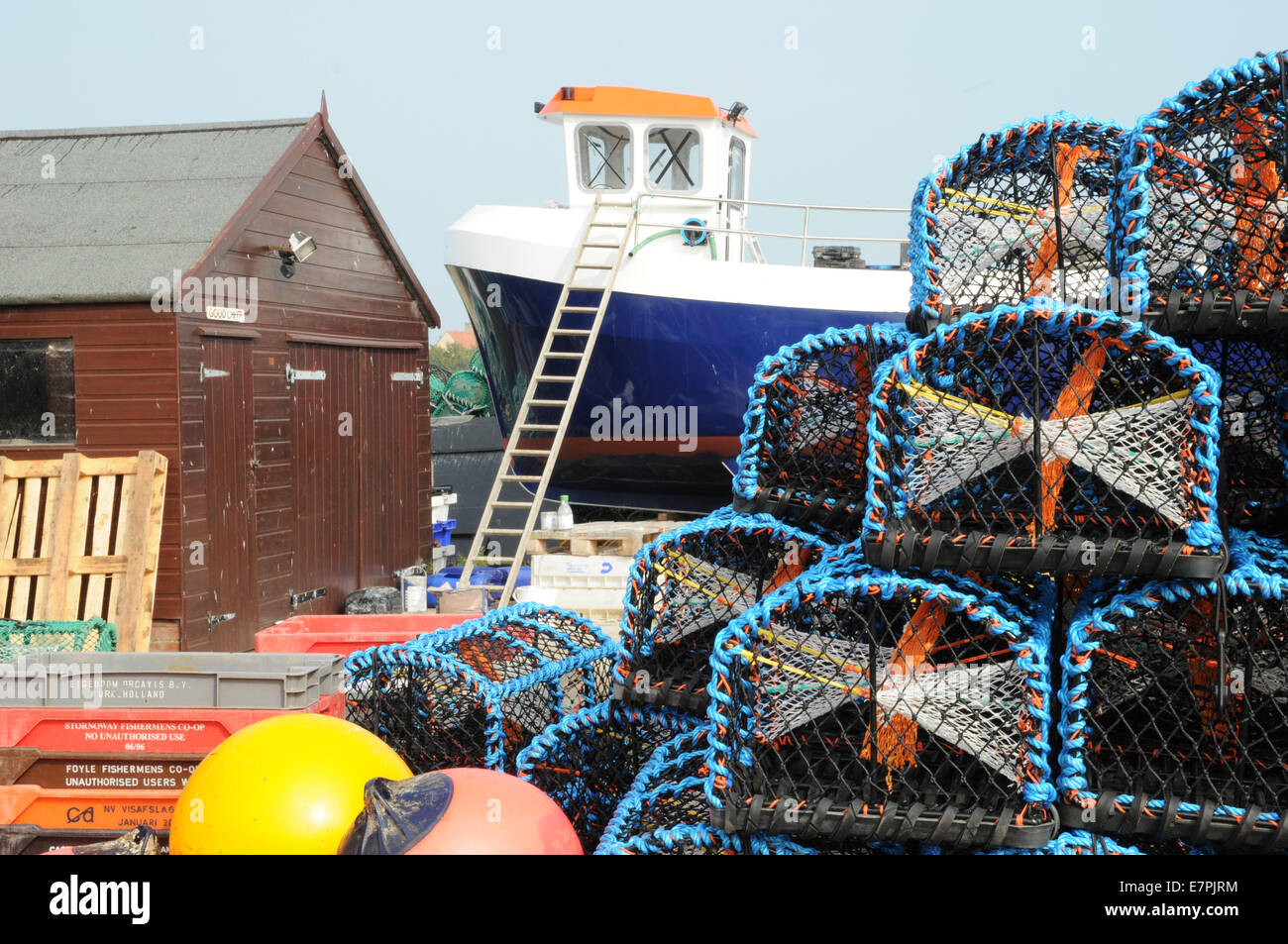 Lobster pots and fishing boat on the Holy Isle of Lindisfarne