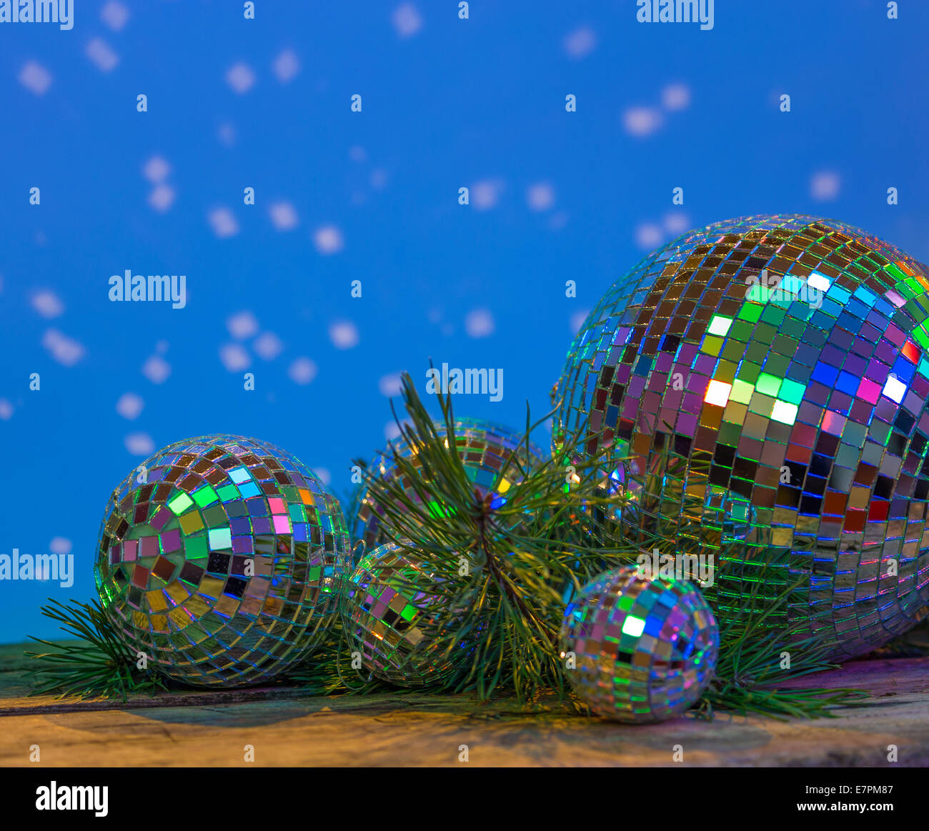 Creative Christmas concept. Shiny gold disco balls over red background.  Flat lay, top view. New year Stock Photo by jchizhe