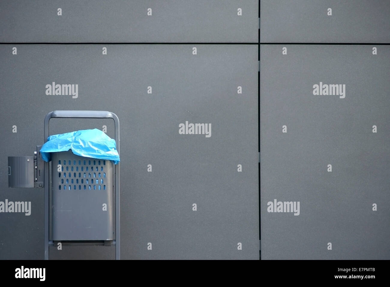 Garbage can and cladding Stock Photo - Alamy