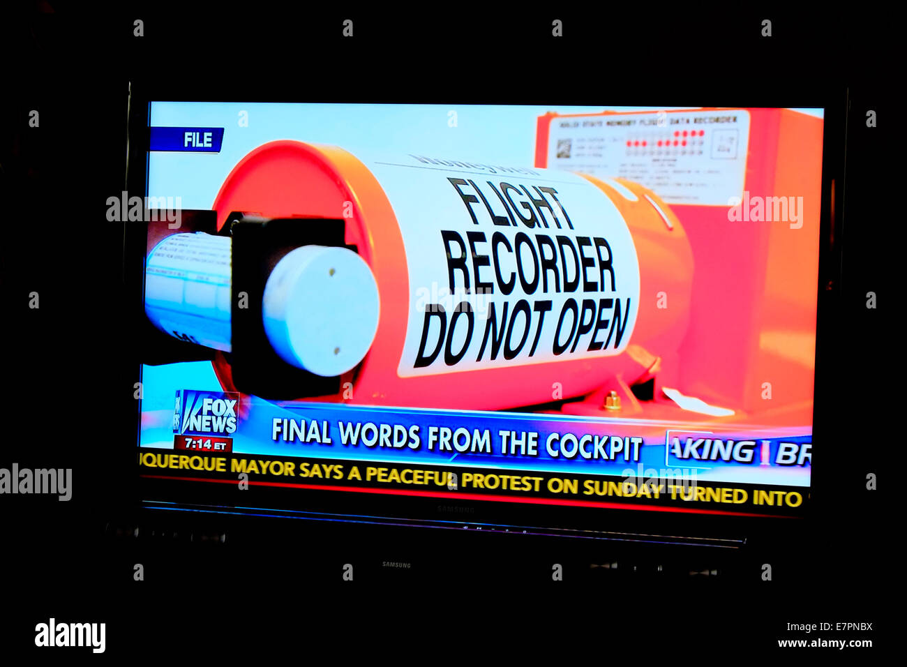 TV News Report about plane crash flight recorder black box Stock Photo