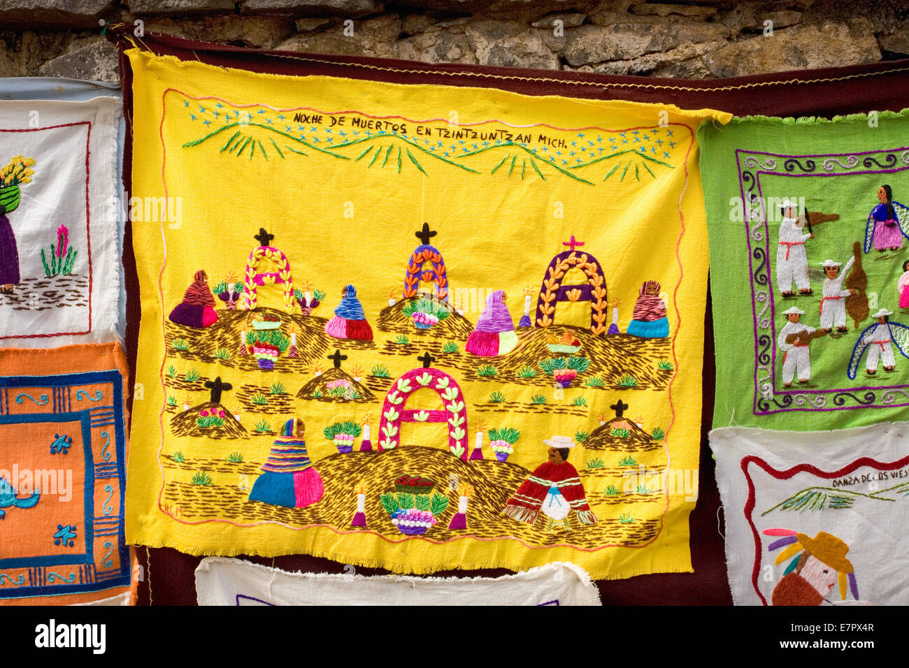 A hand stitched placemat depicts Day of the Dead ni Tzintzuntzan, Michoacan, Mexico. Stock Photo