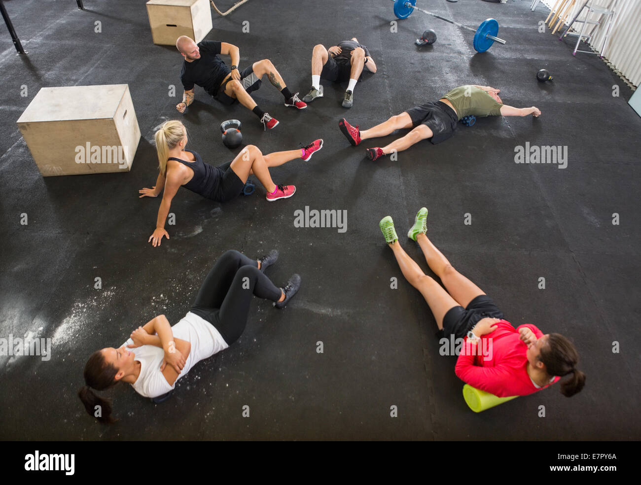 People Stretching in Cross Training Box Stock Photo