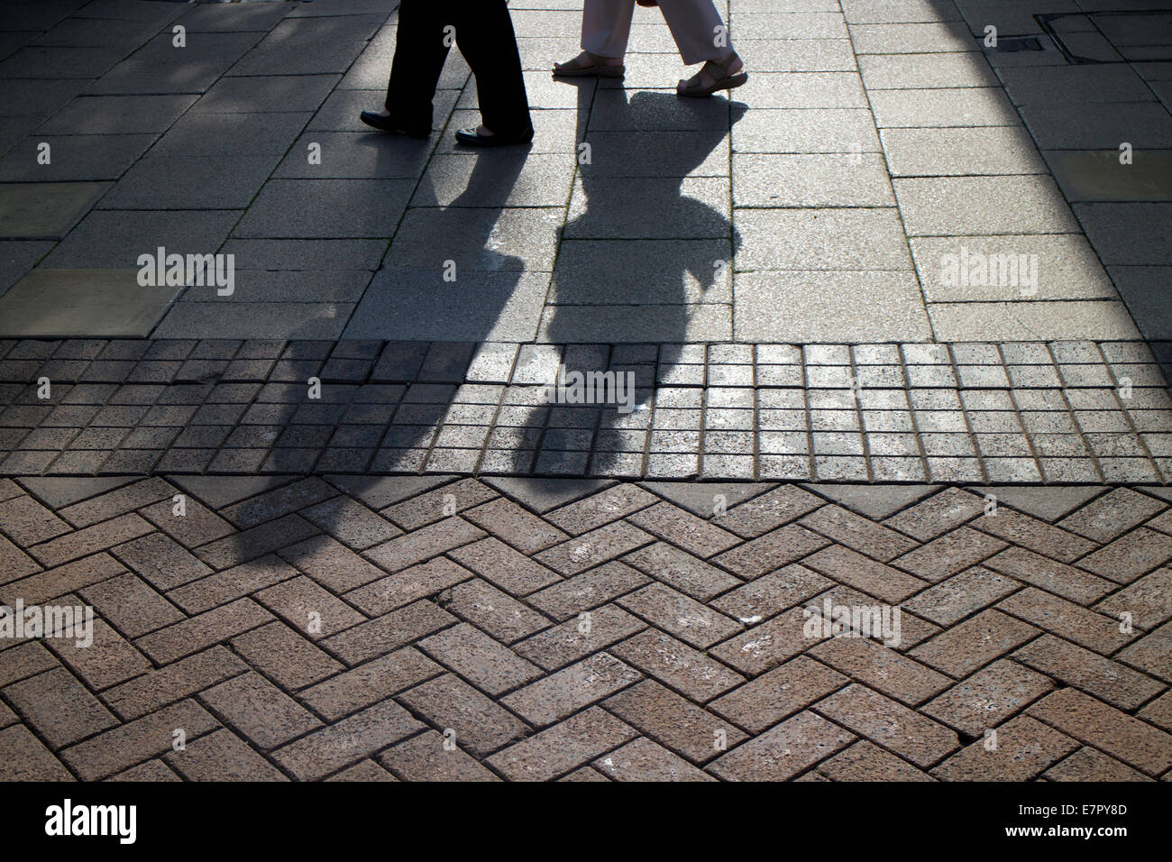 Shadows of people walking in street Stock Photo - Alamy