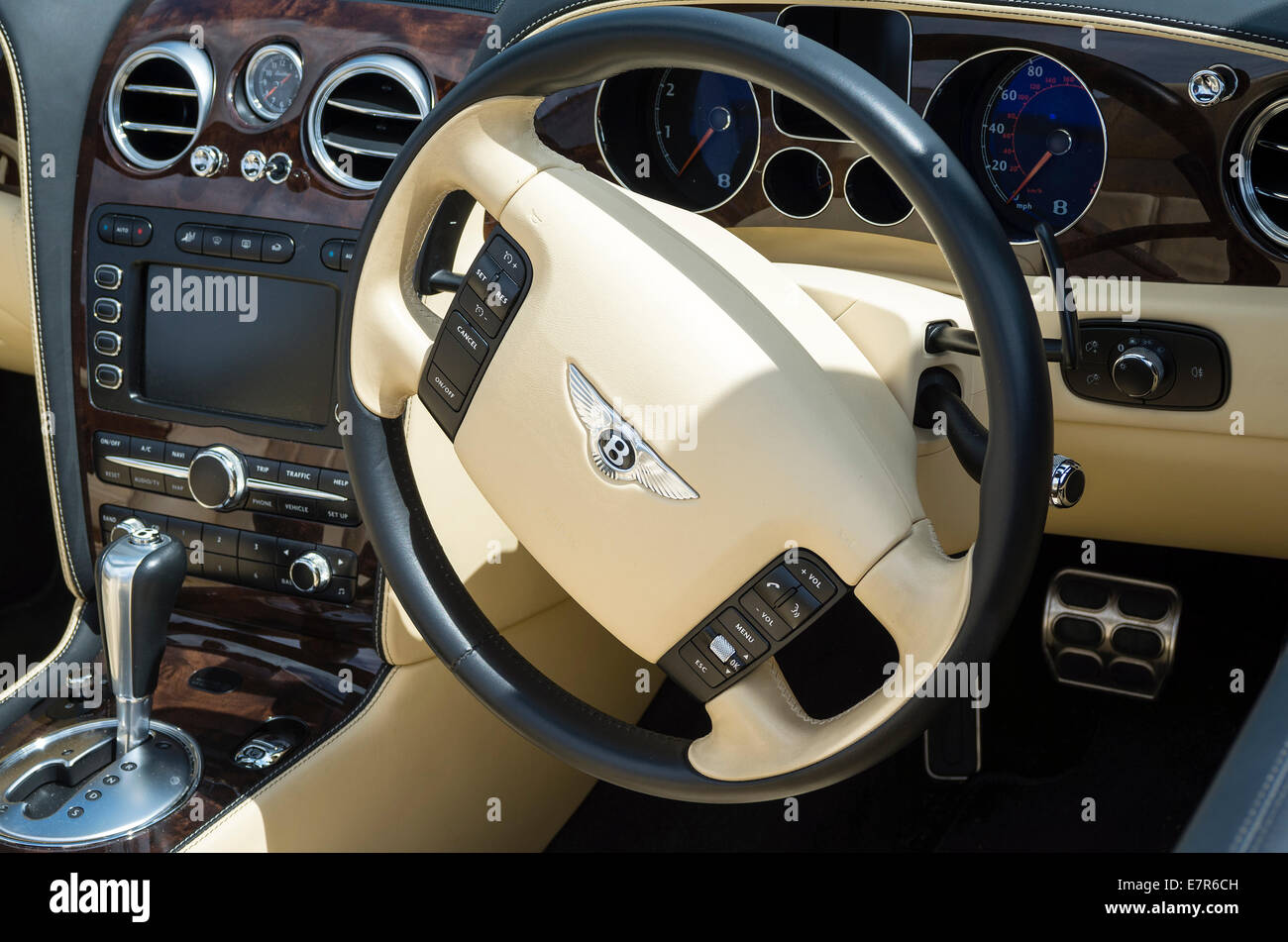 Steering wheel and controls inside a Bentley saloon car at a show Stock Photo
