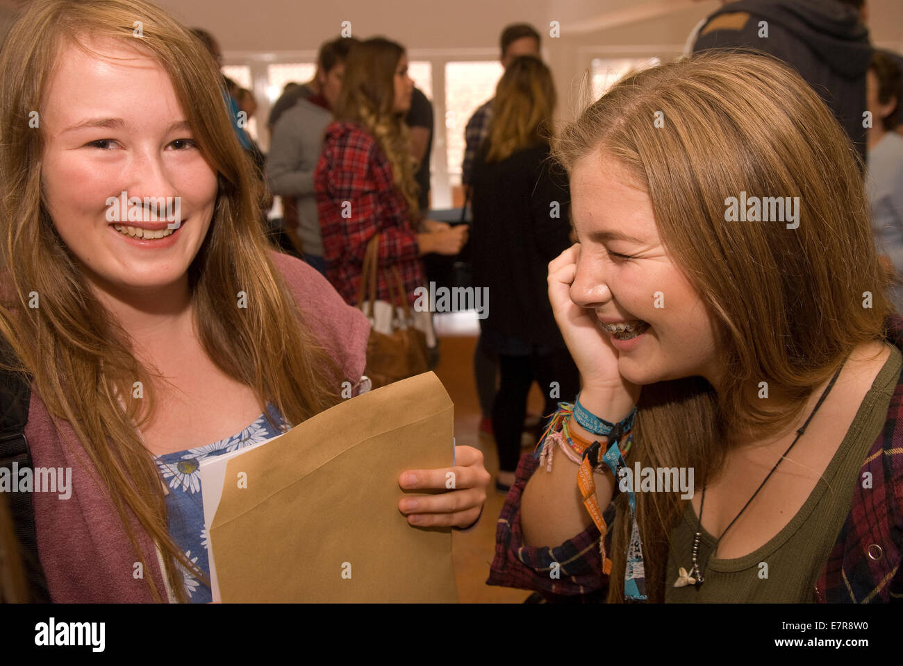 Happy college students with their 2014 A Level Results, Farnham, Surrey, UK. Stock Photo