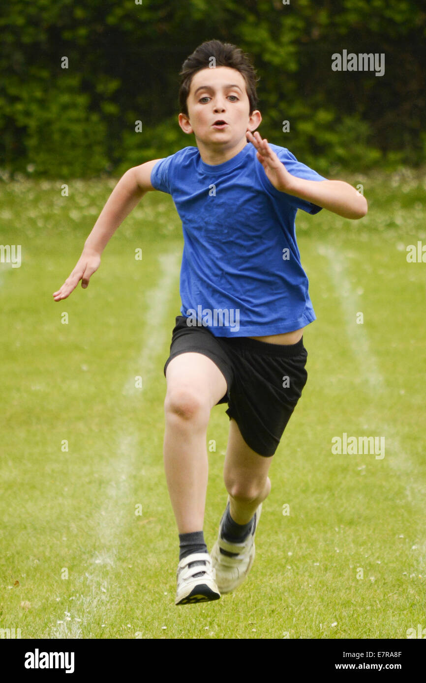 Boy running fast towards camera hi-res stock photography and images - Alamy