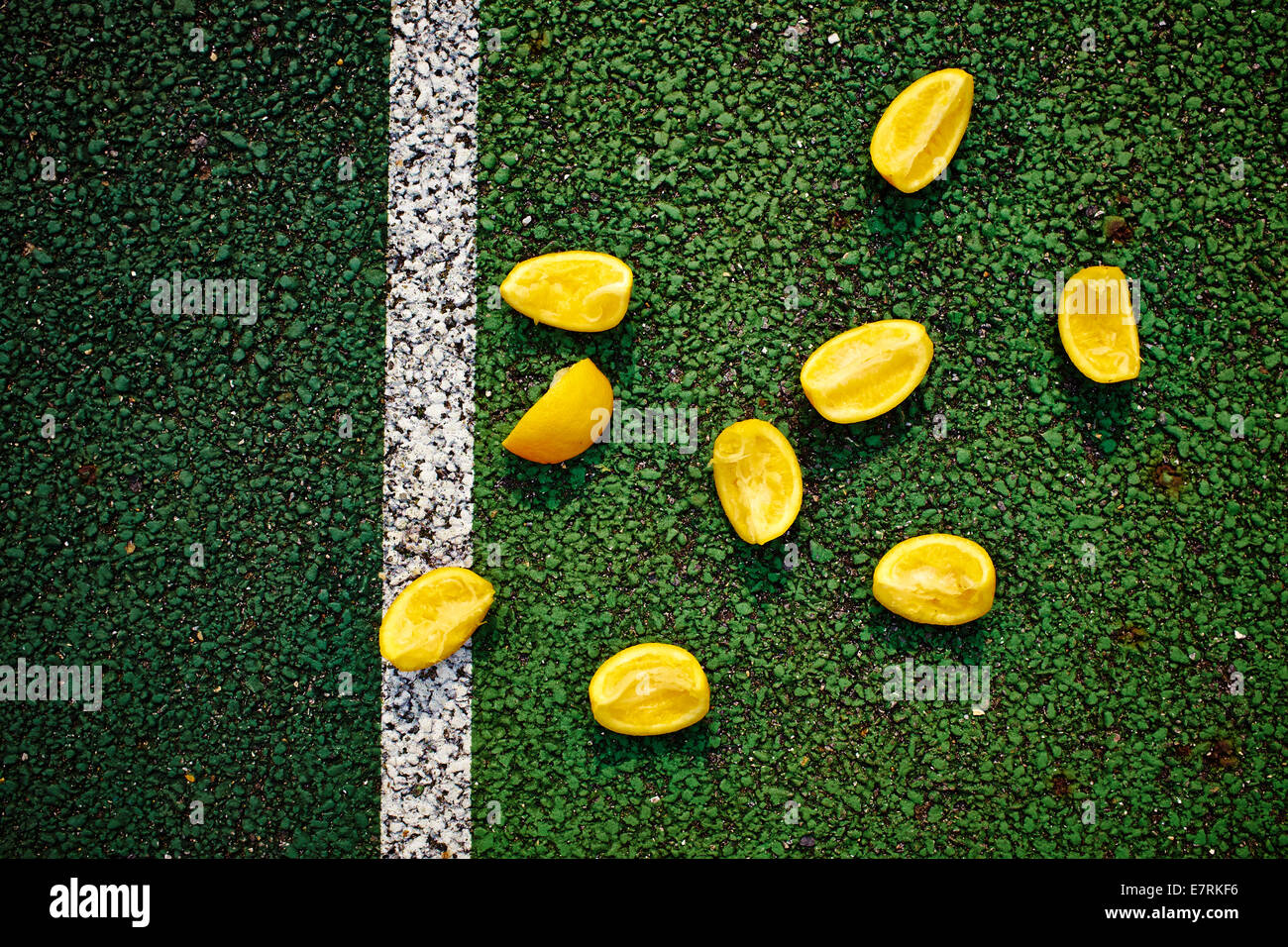 Eaten Half Time Orange Quarters On A Sports Pitch. Stock Photo