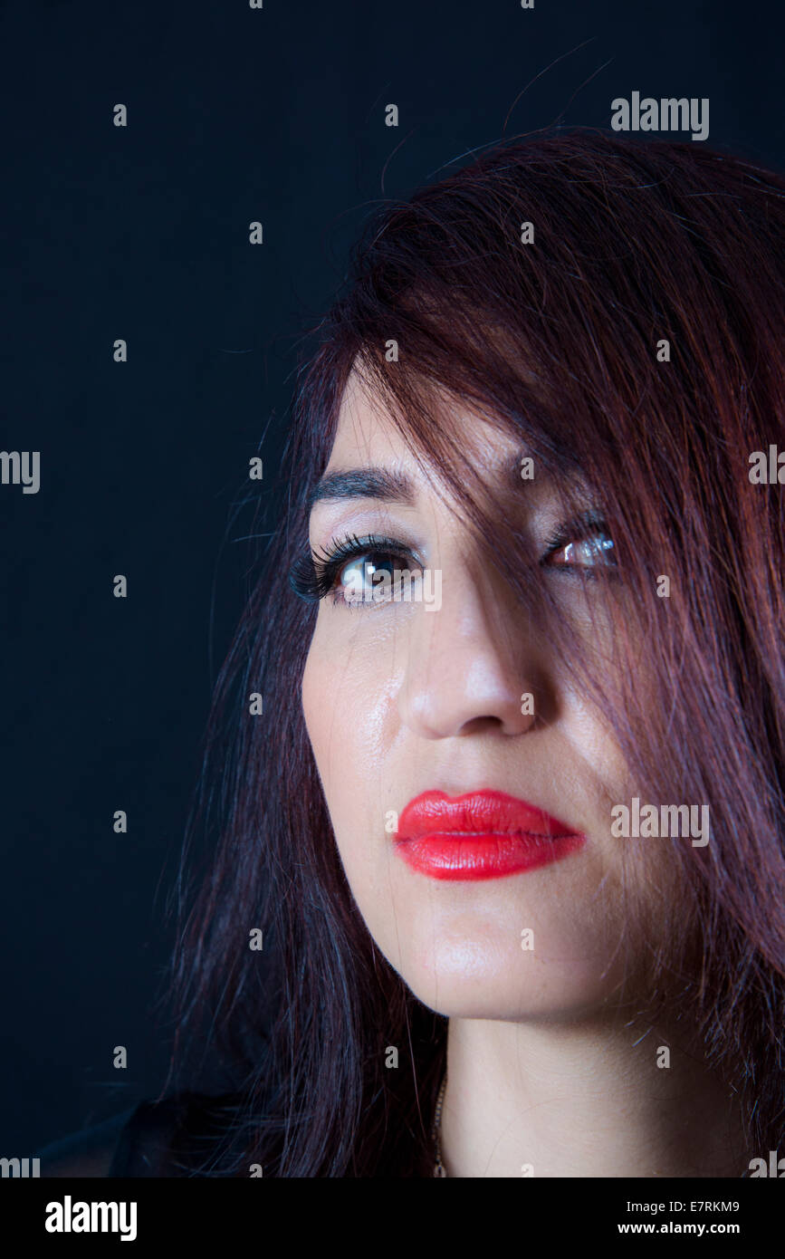 Close up of woman's face with red lipstick Stock Photo