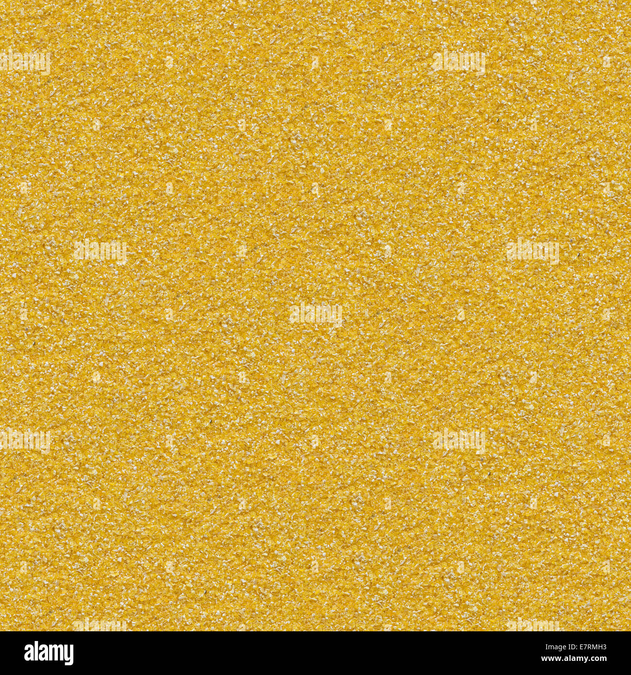 Corn Grits Background. Seamless Texture. Stock Photo