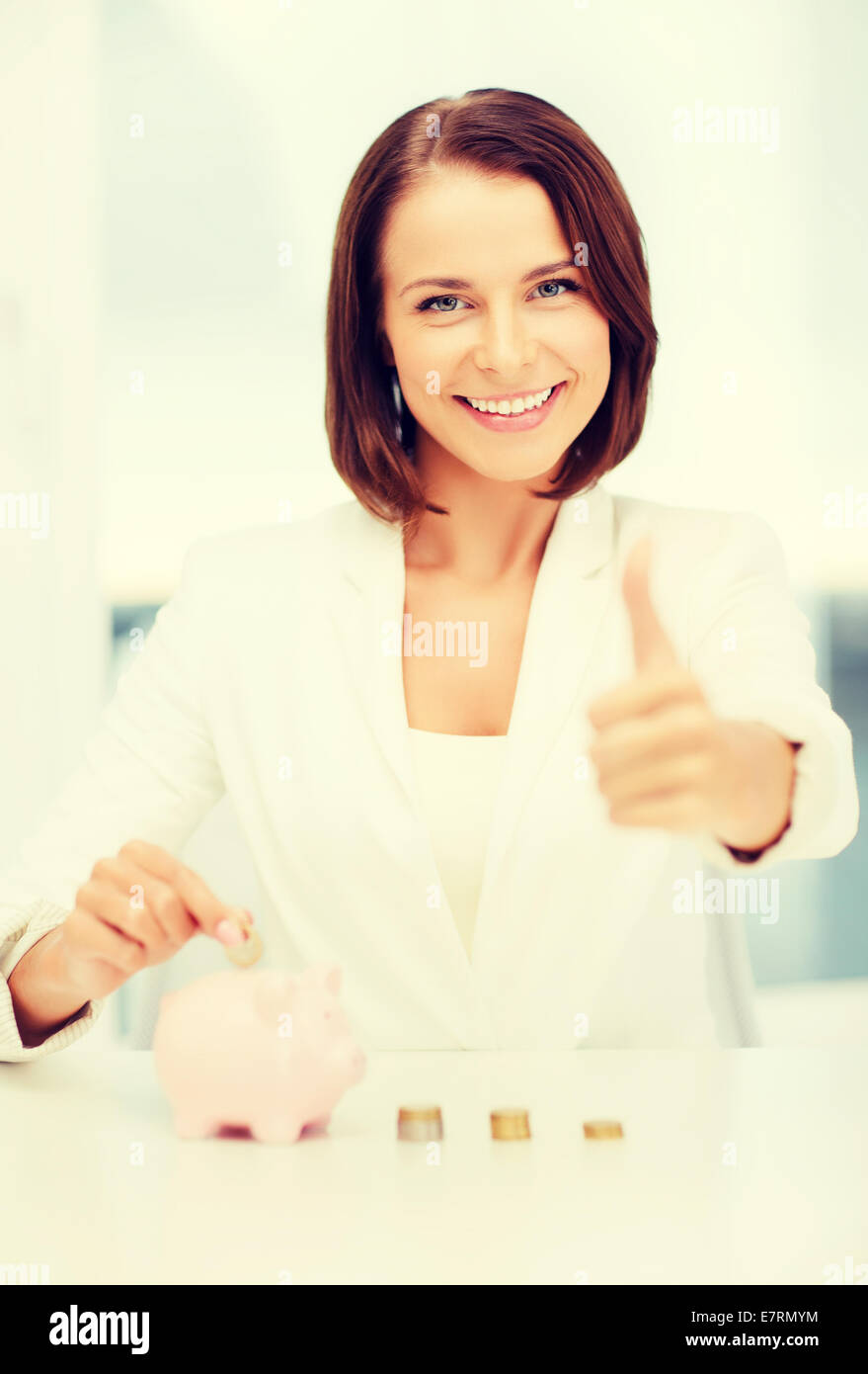 woman with piggy bank and cash money Stock Photo - Alamy