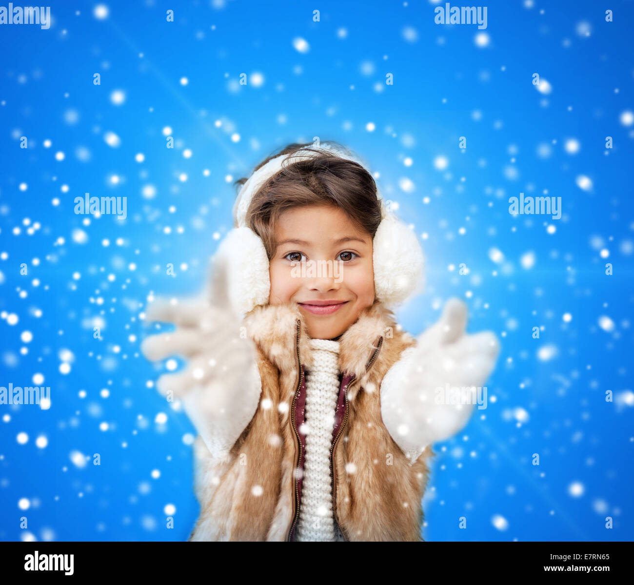 smiling little girl in winter clothes Stock Photo - Alamy