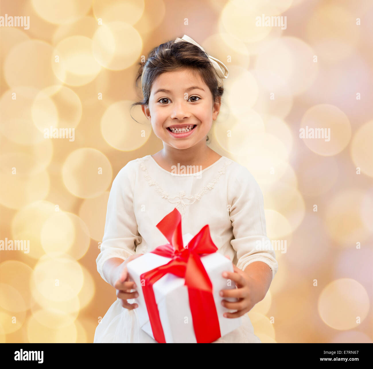 smiling little girl with gift box Stock Photo - Alamy