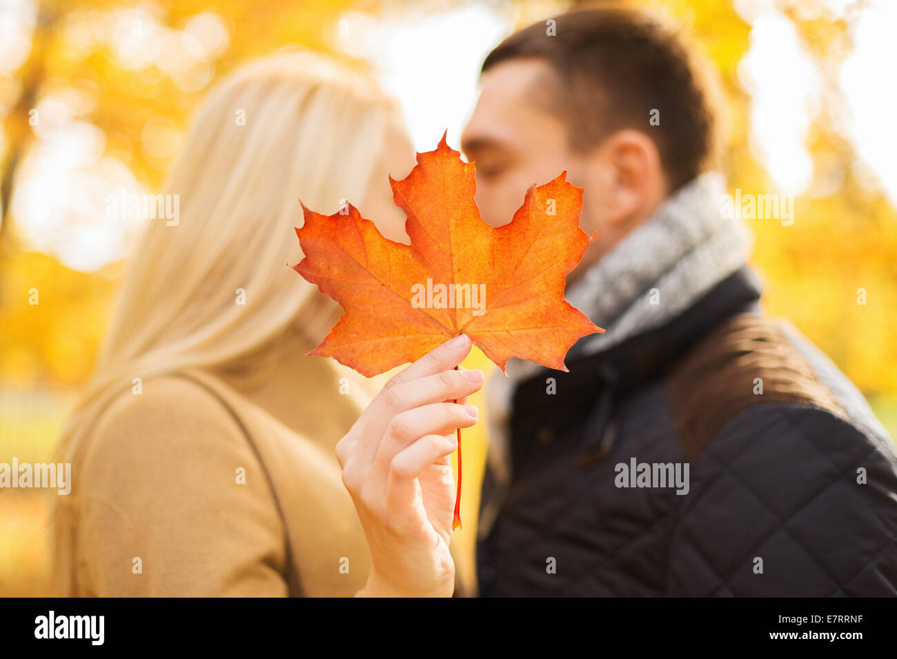 close up of couple kissing in autumn park Stock Photo - Alamy