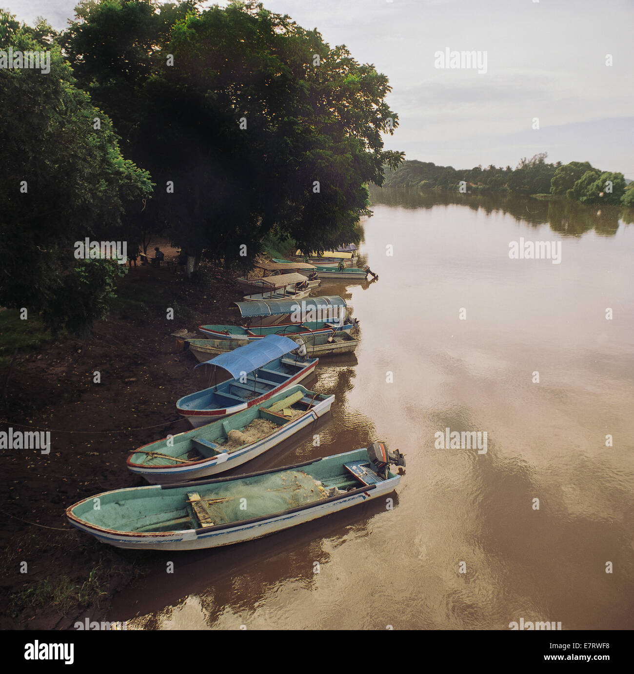 fishing boats on a river in mexico Stock Photo - Alamy