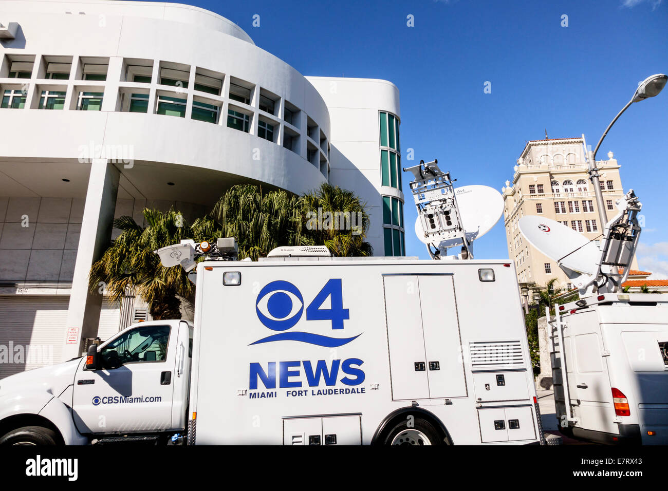 Miami Beach Florida,police station,news truck,vehicle,dish,television,satellite dish,CBS,communication,media,live transmission,FL140201002 Stock Photo