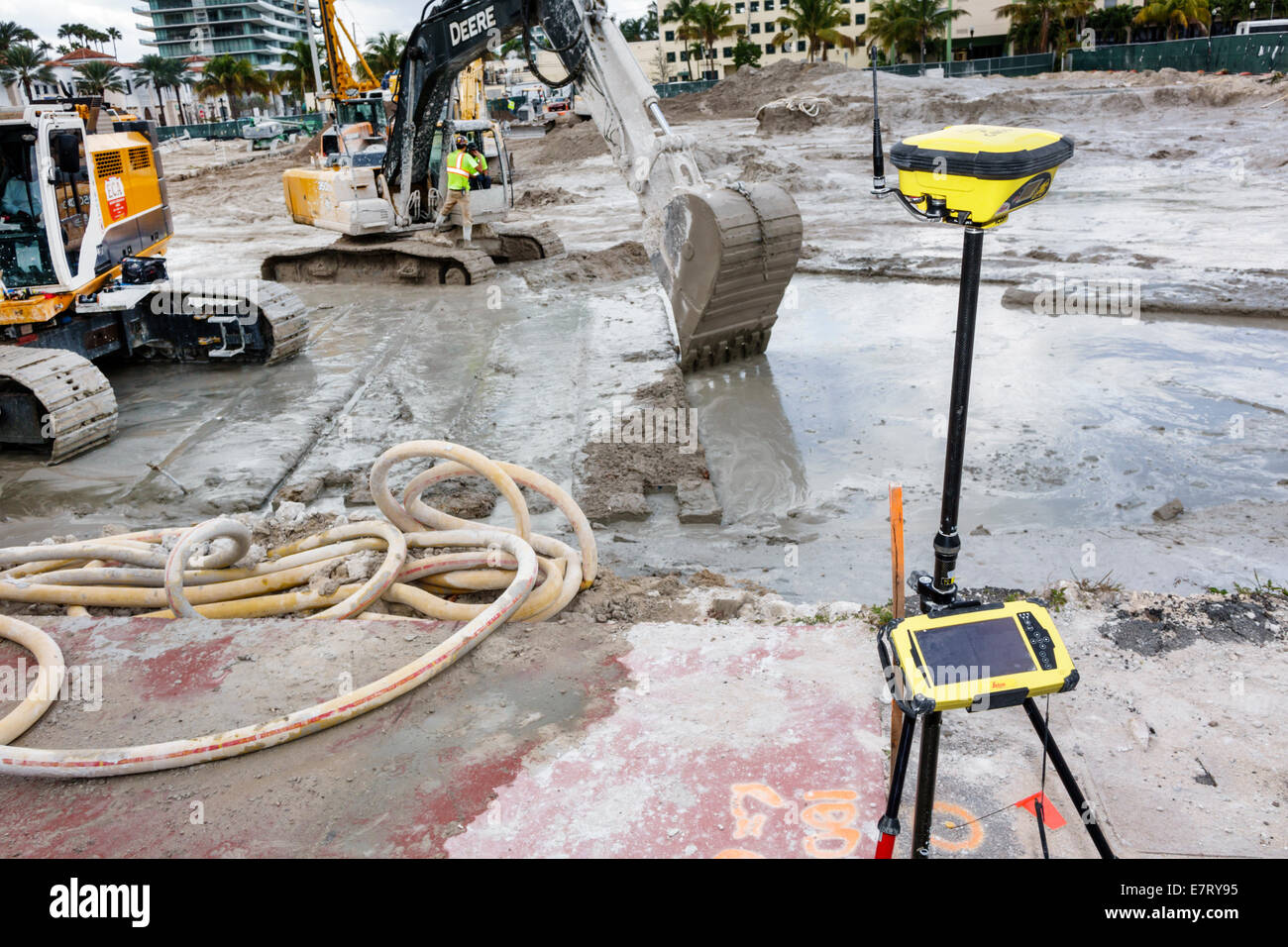 Miami Beach Florida,construction site,excavator,surveyor's equipment,leveling instrument,dumpy level,digital,computerized,laser,foundation,building,FL Stock Photo