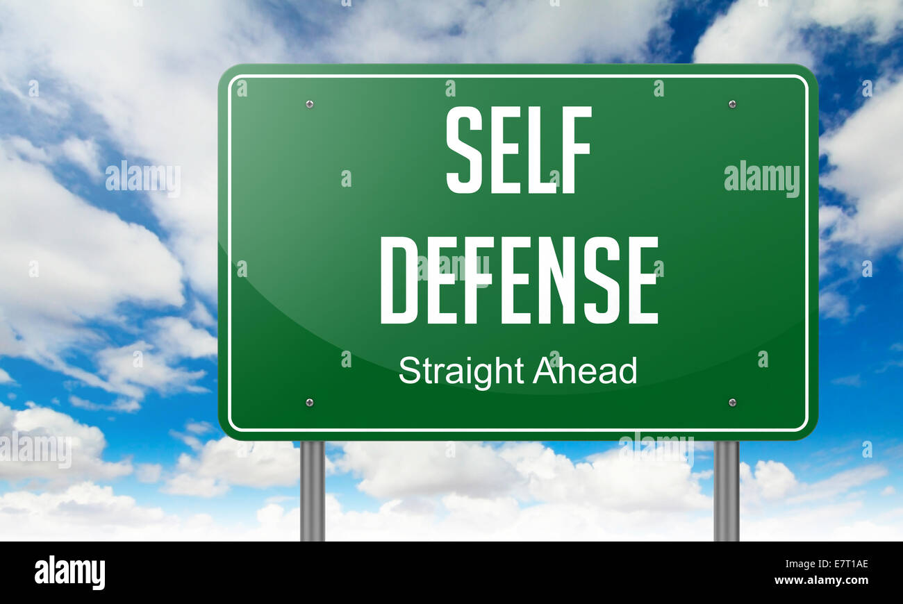 Self Defense on Highway Signpost Stock Photo - Alamy