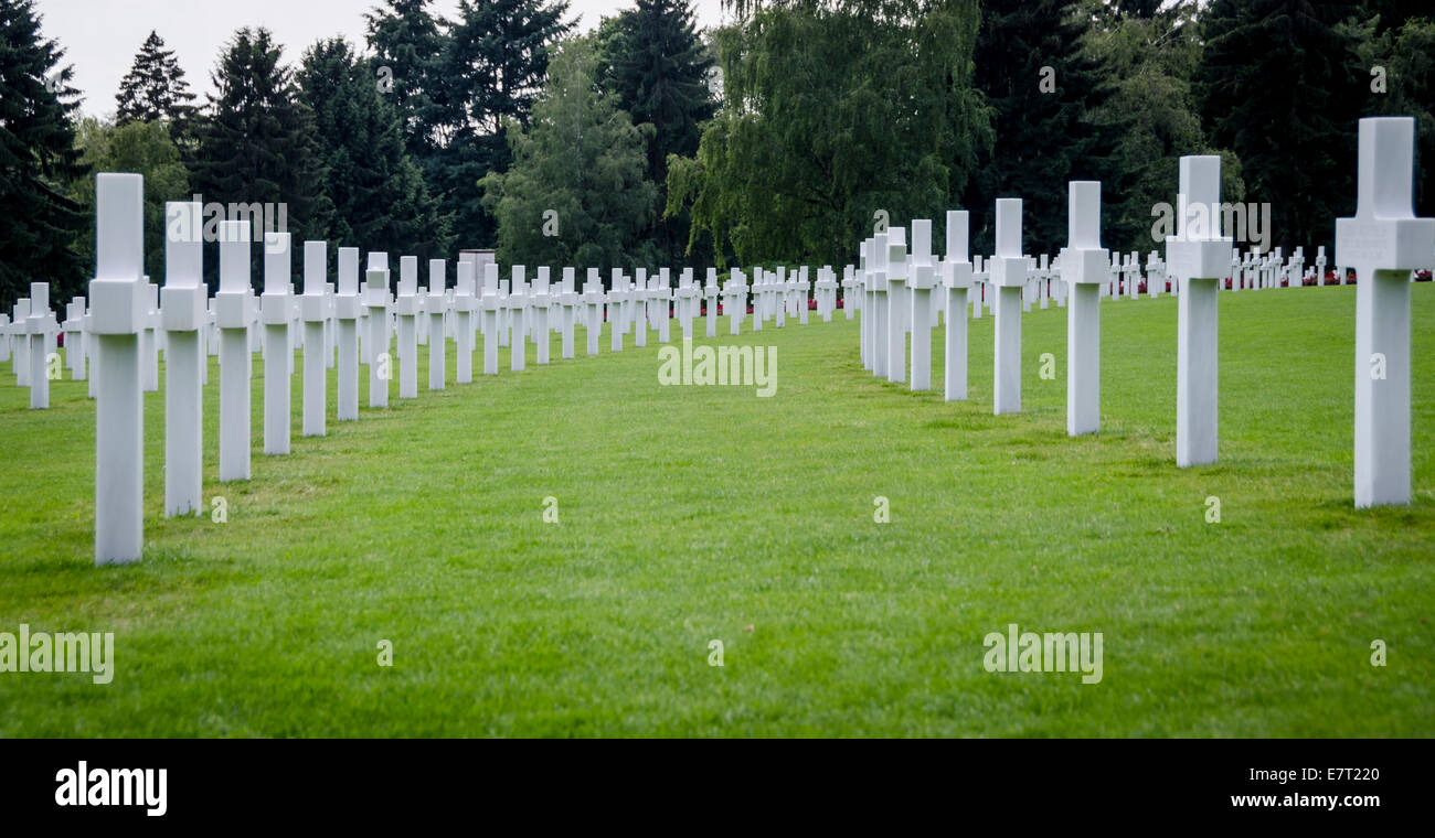 Rows of white headstones Stock Photo