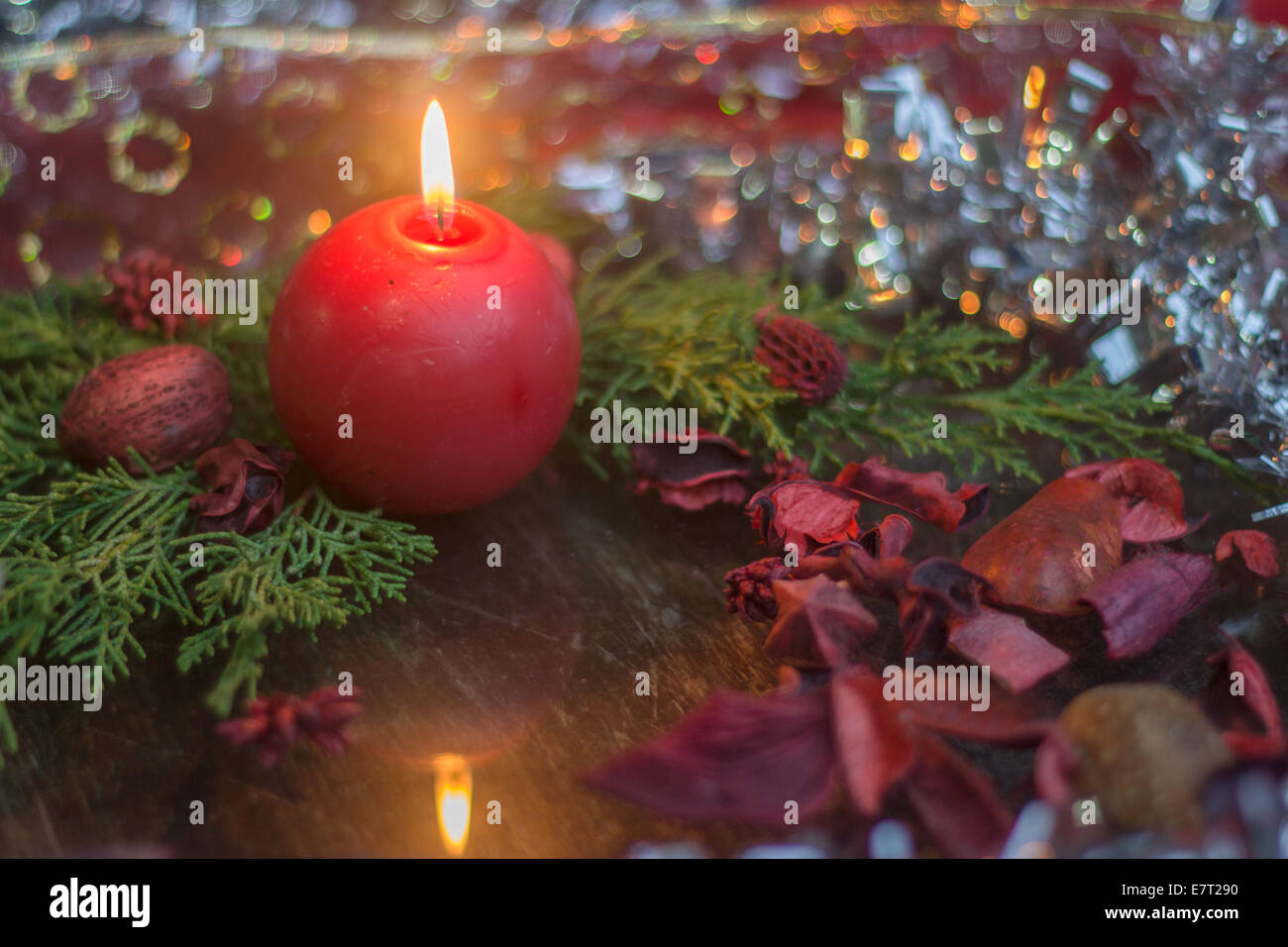 Christmas candle flame reflection decorations festive dark dusk nobody Stock Photo - Alamy