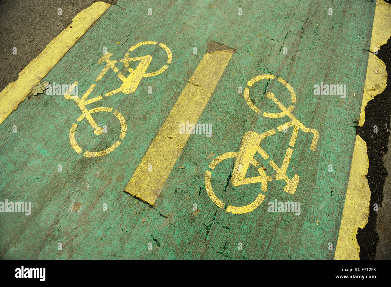 Detail with a deteriorated bicycle lane Stock Photo