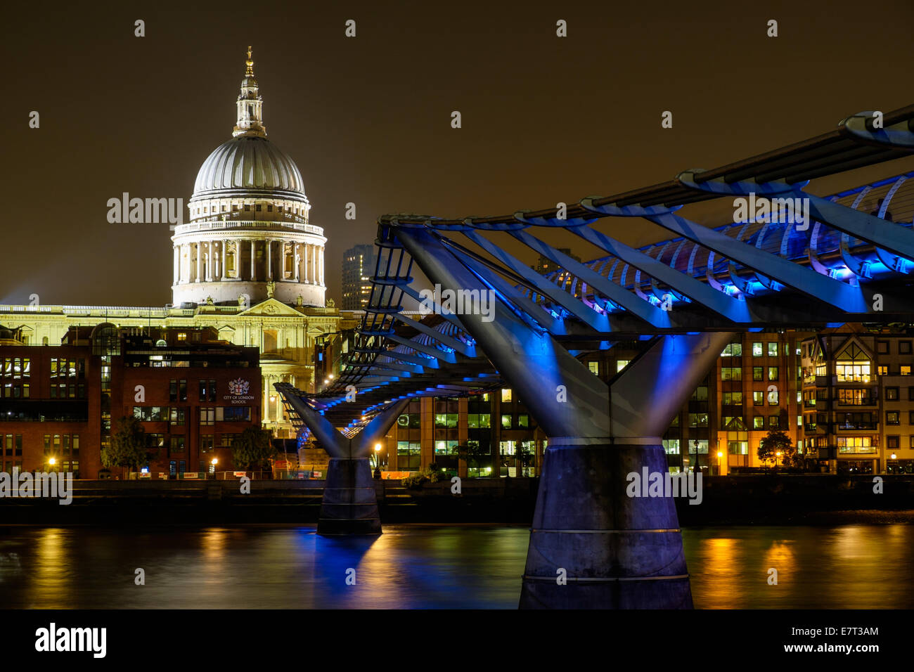Night time long exposure view of St Pauls cathedral and the millennium bridge from the south bank of the river thames London Stock Photo