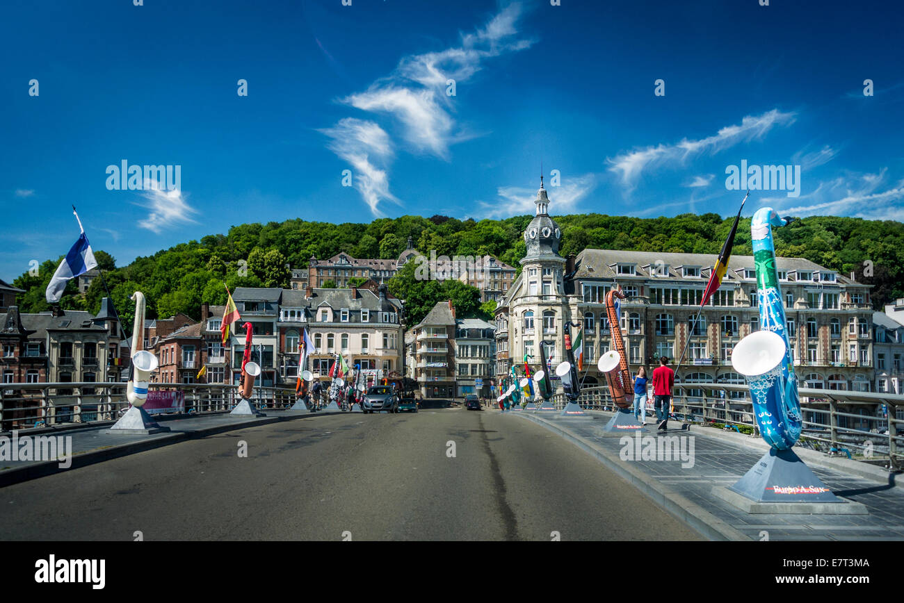 Colourful saxaphones lining each side of a bridge in Dinant, Belgium Stock Photo