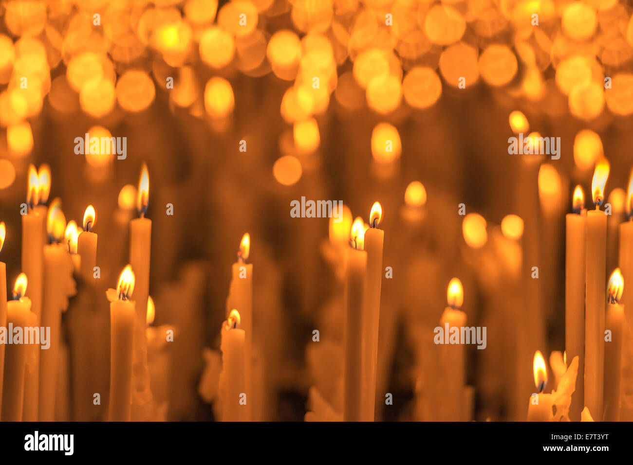 burning orange candles close up Stock Photo Alamy