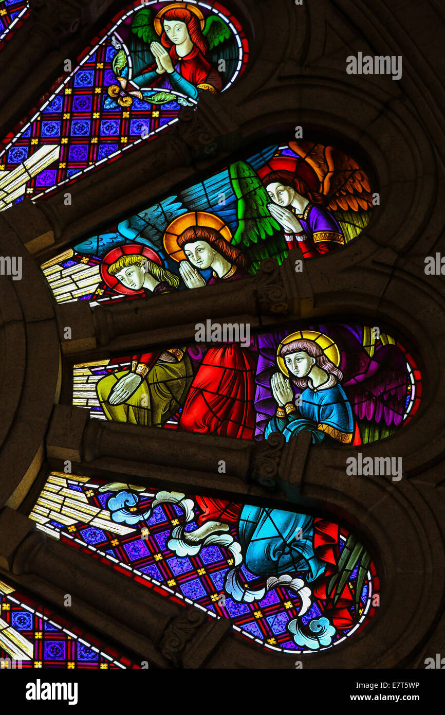 Stained glass window depicting praying angels in the church of Viana do Castelo, Portugal Stock Photo