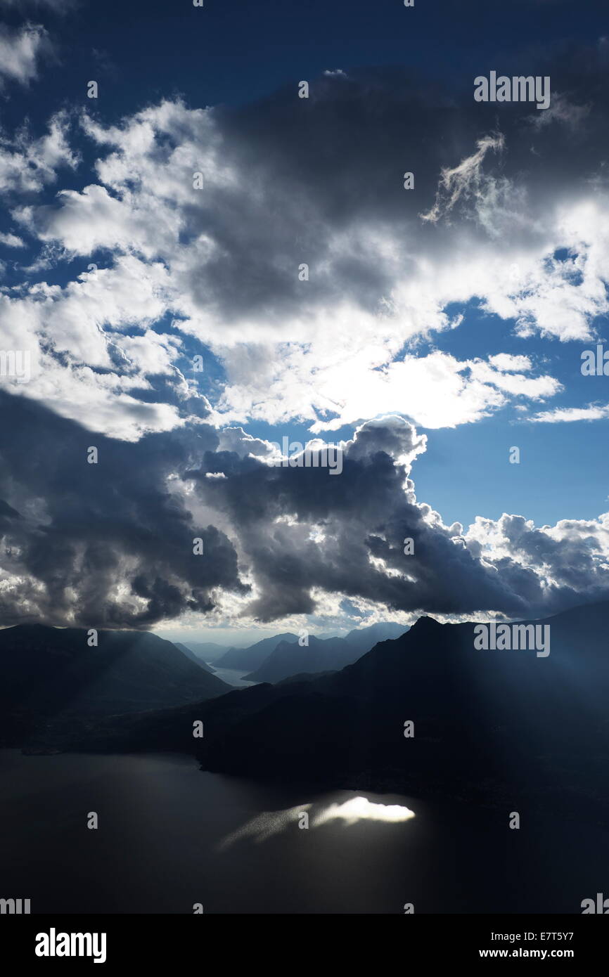 Sun, clouds and shadows over the mountains, Italy Stock Photo