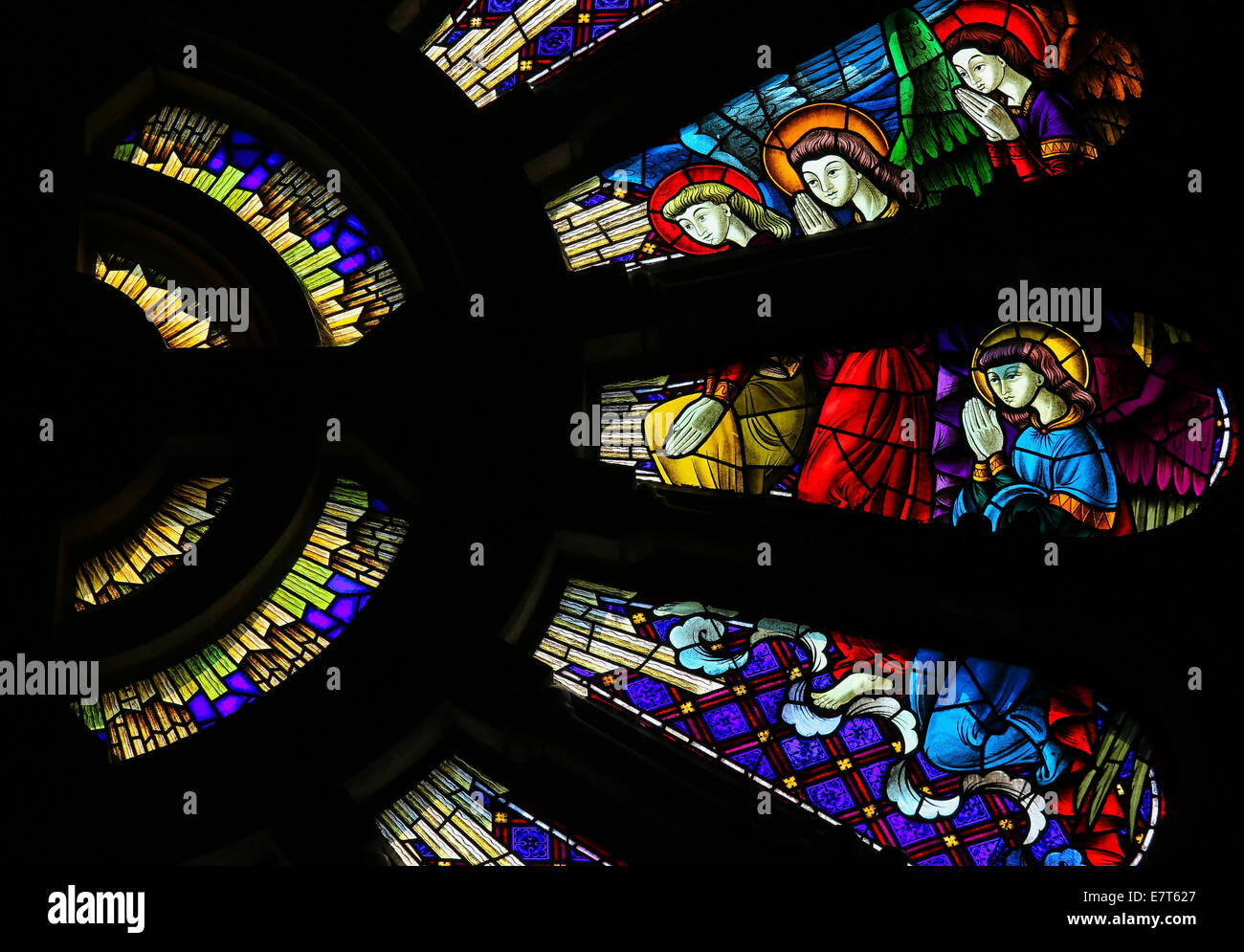 Stained glass window depicting praying angels in the church of Viana do Castelo, Portugal Stock Photo