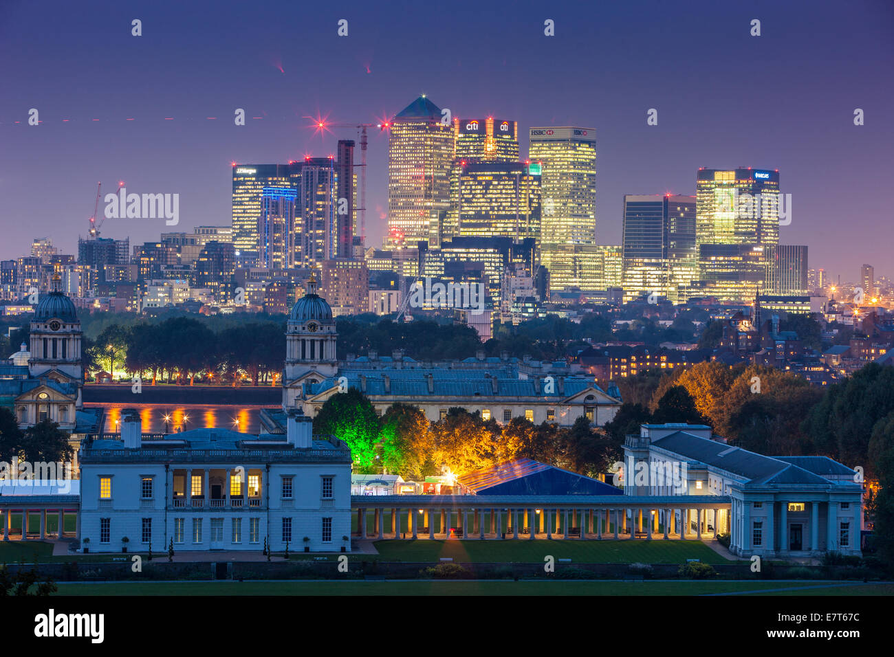 Canary Wharf and the London City  tower background with the old Royal Navy College in the foreground. evening landscape shot Stock Photo