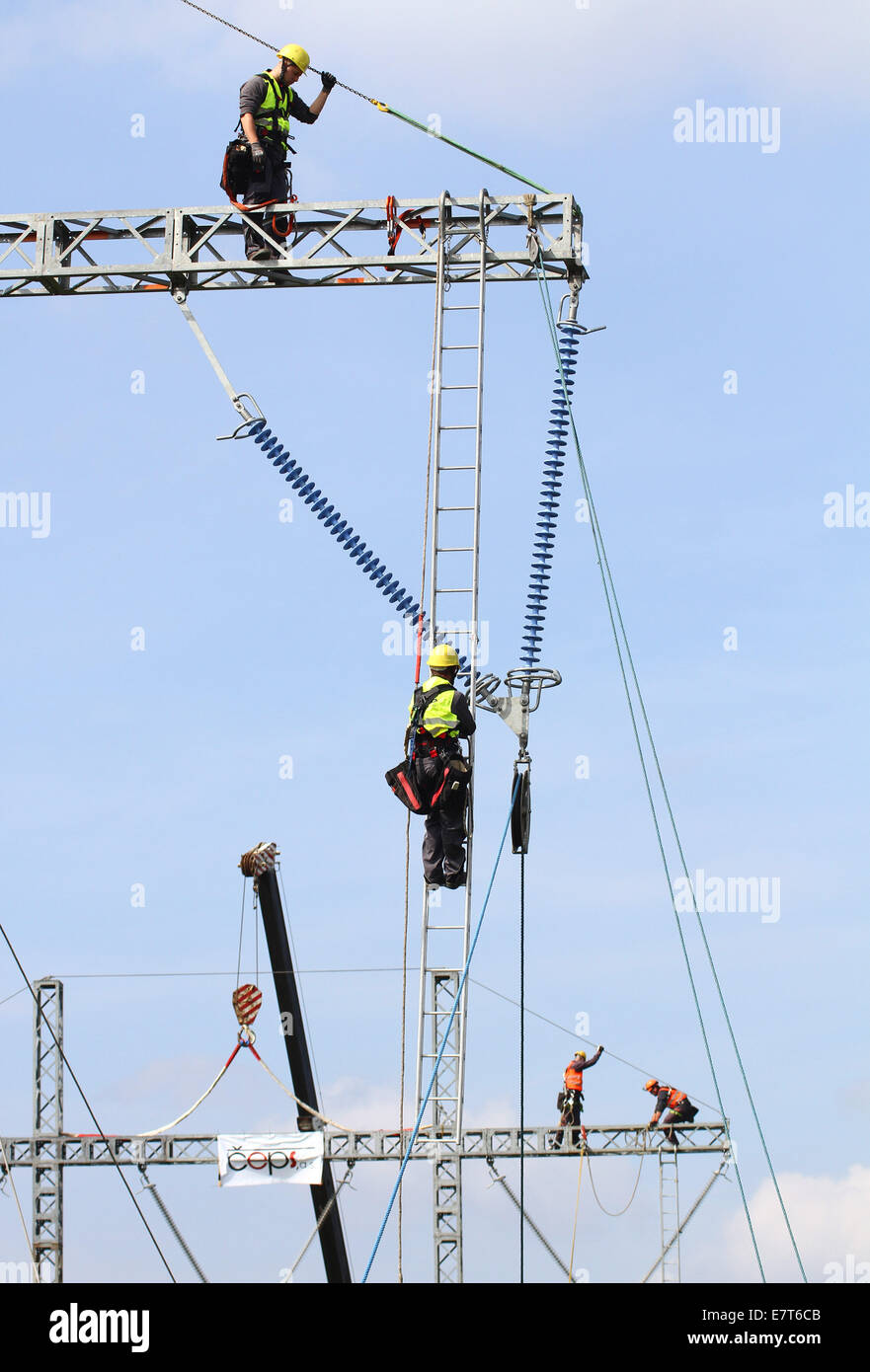 A complex emergency exercise of German and Czech rescue workers in an electricity power line near Hora Sv. Sebastiana, Czech Republic, on September 16, 2014. Around 200 experts are taking part in the unique international security exercise involving the failure of power grids entitled DRILL by Czech power grid operator CEPS and German operator 50Hertz. (CTK Photo/Ondrej Hajek) Stock Photo