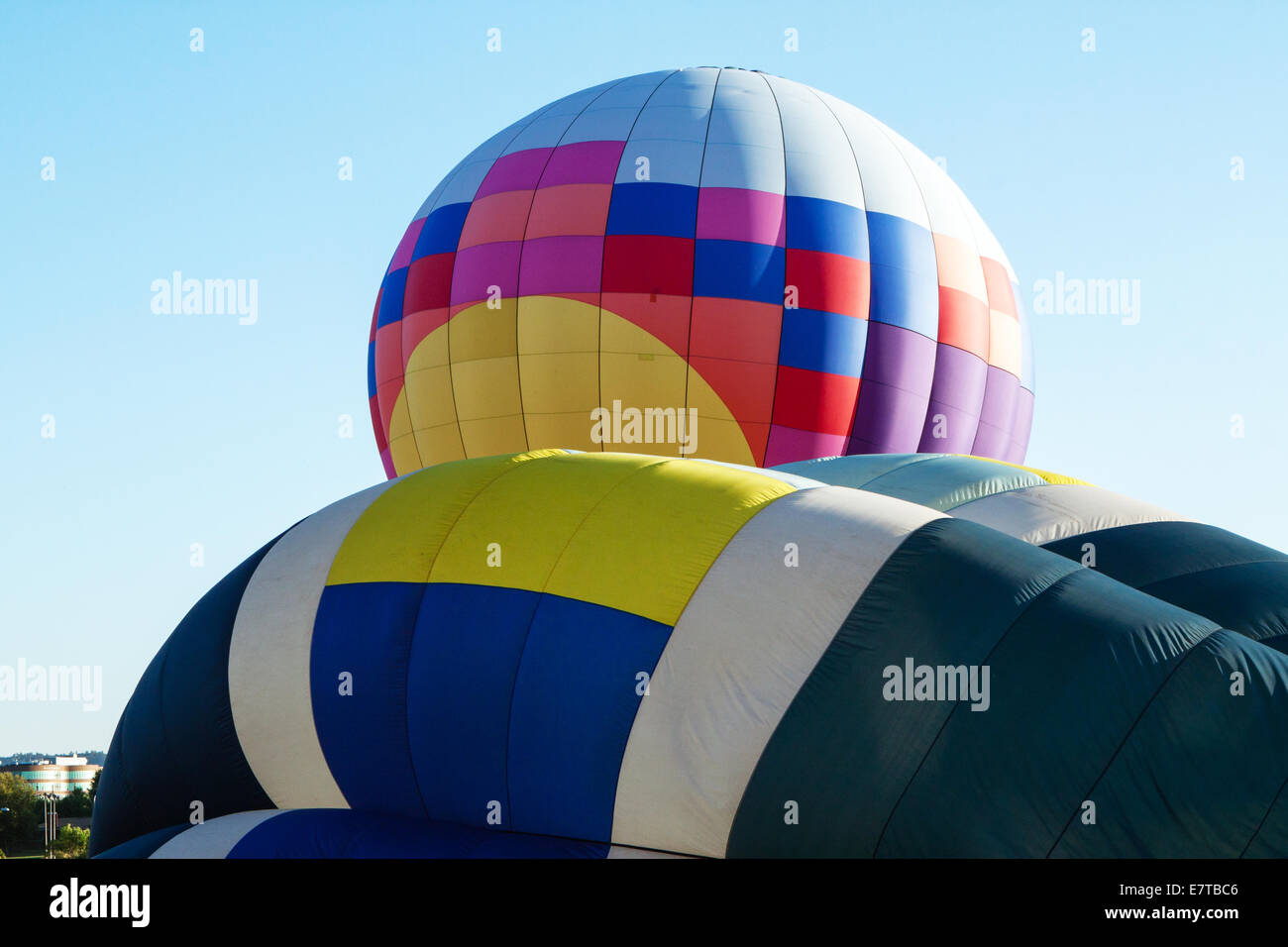 Hot air balloons being inflated and readied for launch Stock Photo