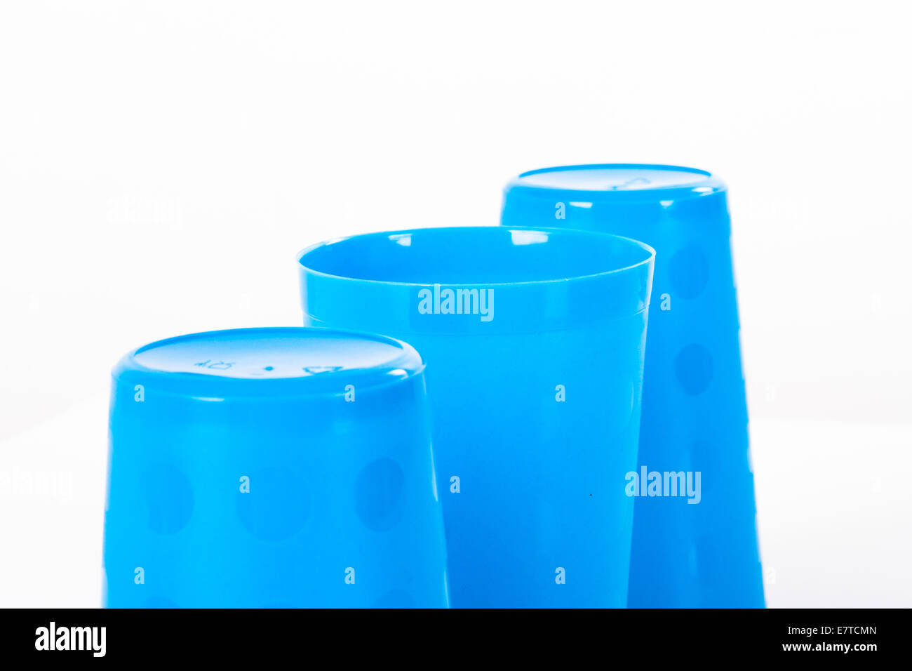 Thimblerig with three plastic glasses, isolated on white background ...