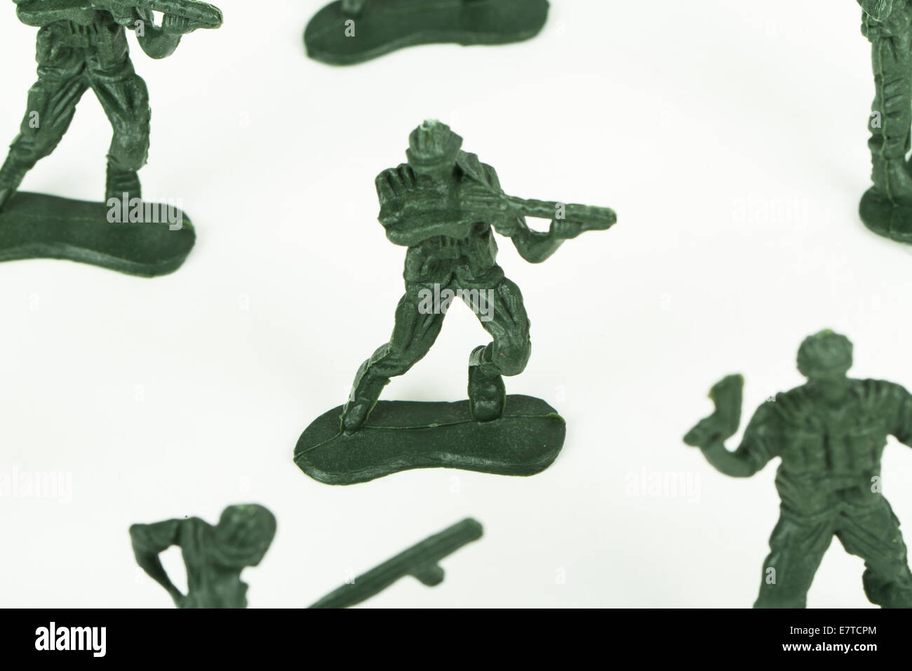 Miniature toy soldiers, isolated on white background. Stock Photo