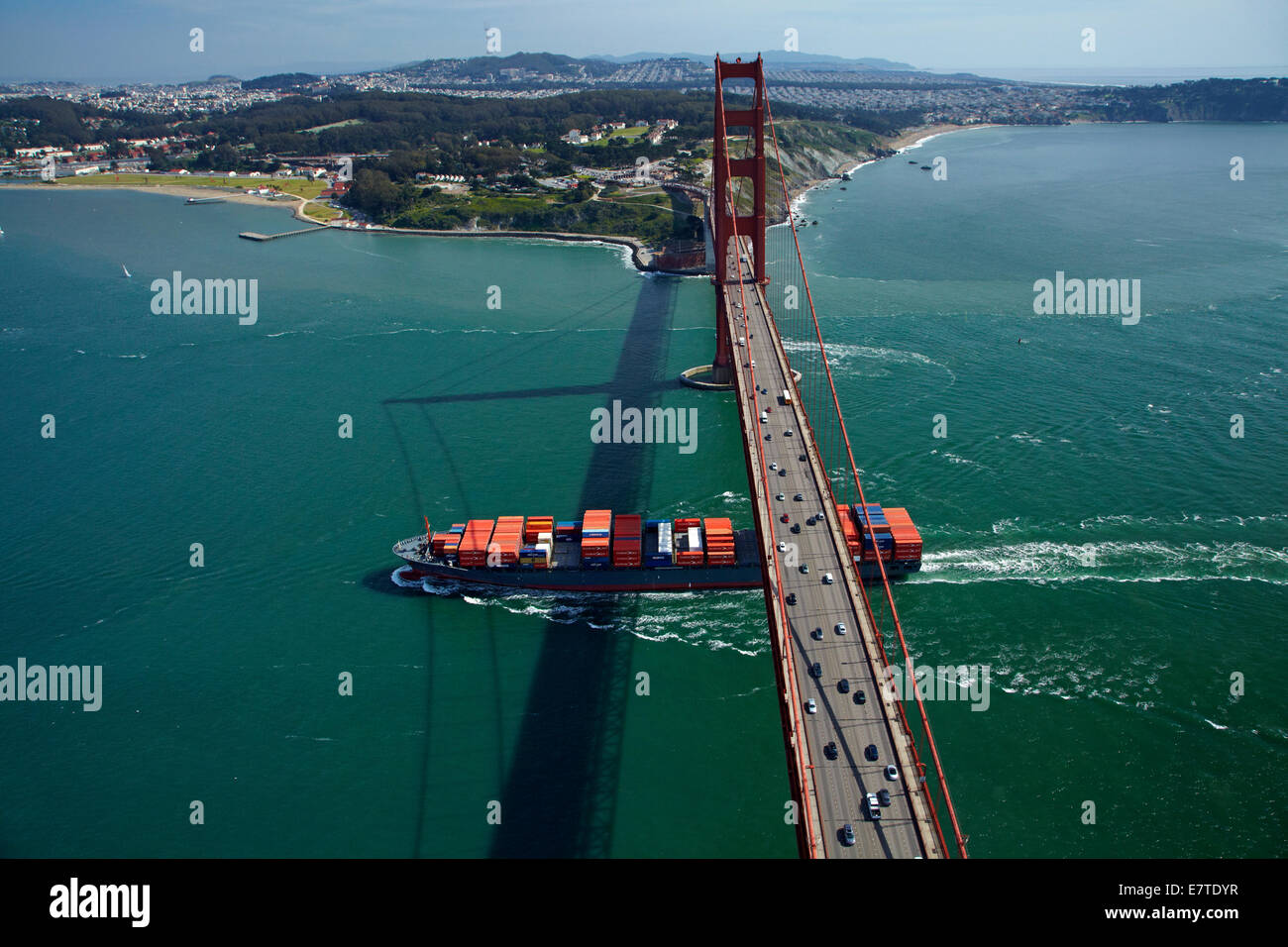 container-ship-passing-under-traffic-on-