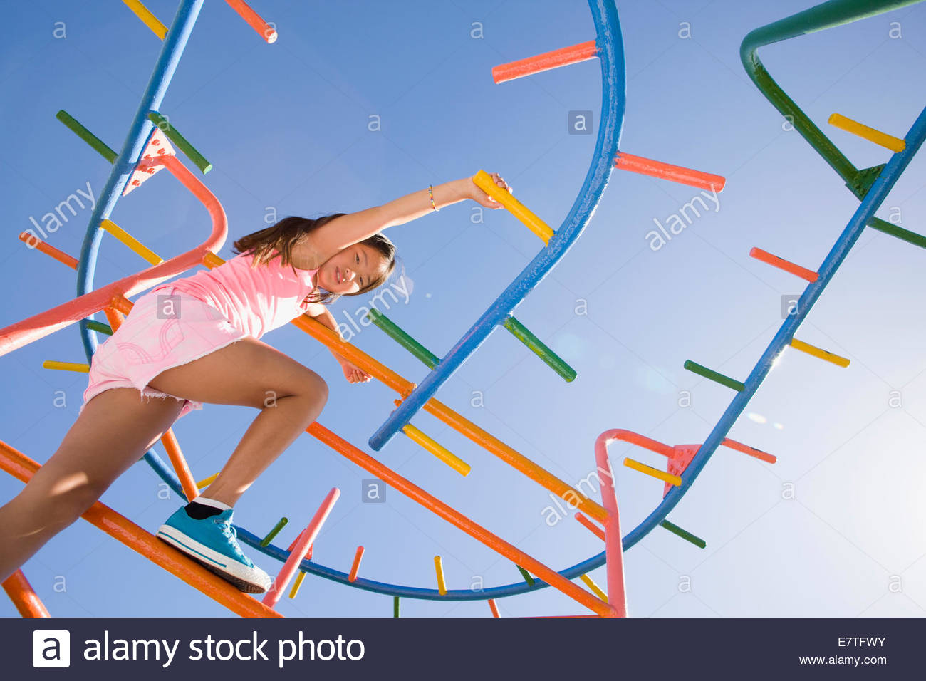 Girl On Playground Monkey Bars Stock Photos & Girl On Playground Monkey