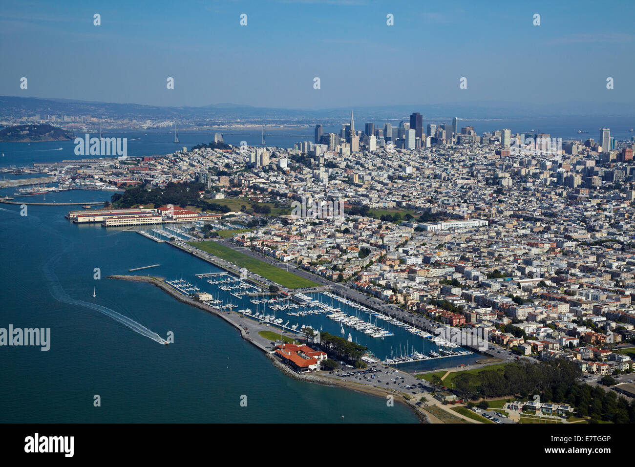 Marina of St. Francis Yacht Club and Golden Gate Yacht Club, and downtown San Francisco, California, USA - aerial Stock Photo
