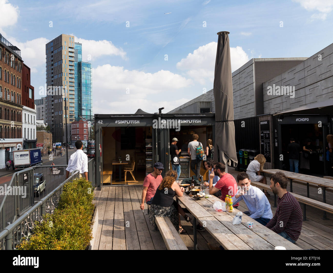 Street food in Shoreditch on roof of the container shops of Boxpark. Stock Photo