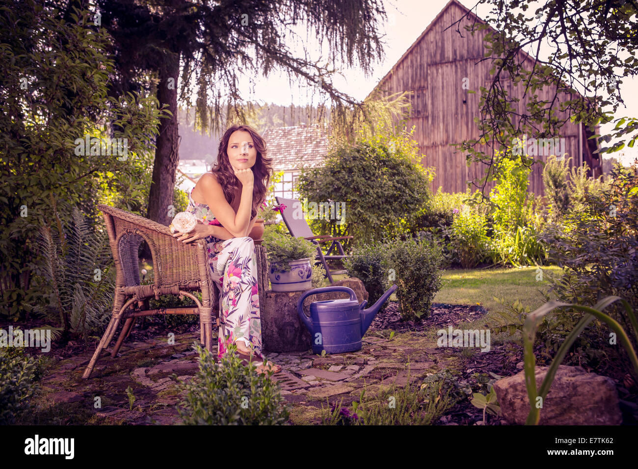 portrait of a young woman in the garden Stock Photo - Alamy