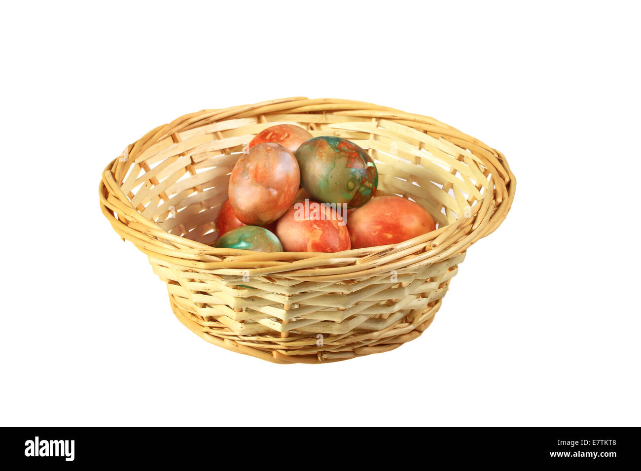 Easter colored eggs in basket isolated on white background Stock Photo ...