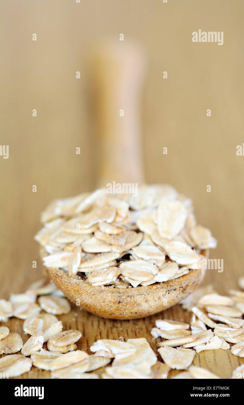 Whole rolled oats (Avena sativa). Stock Photo