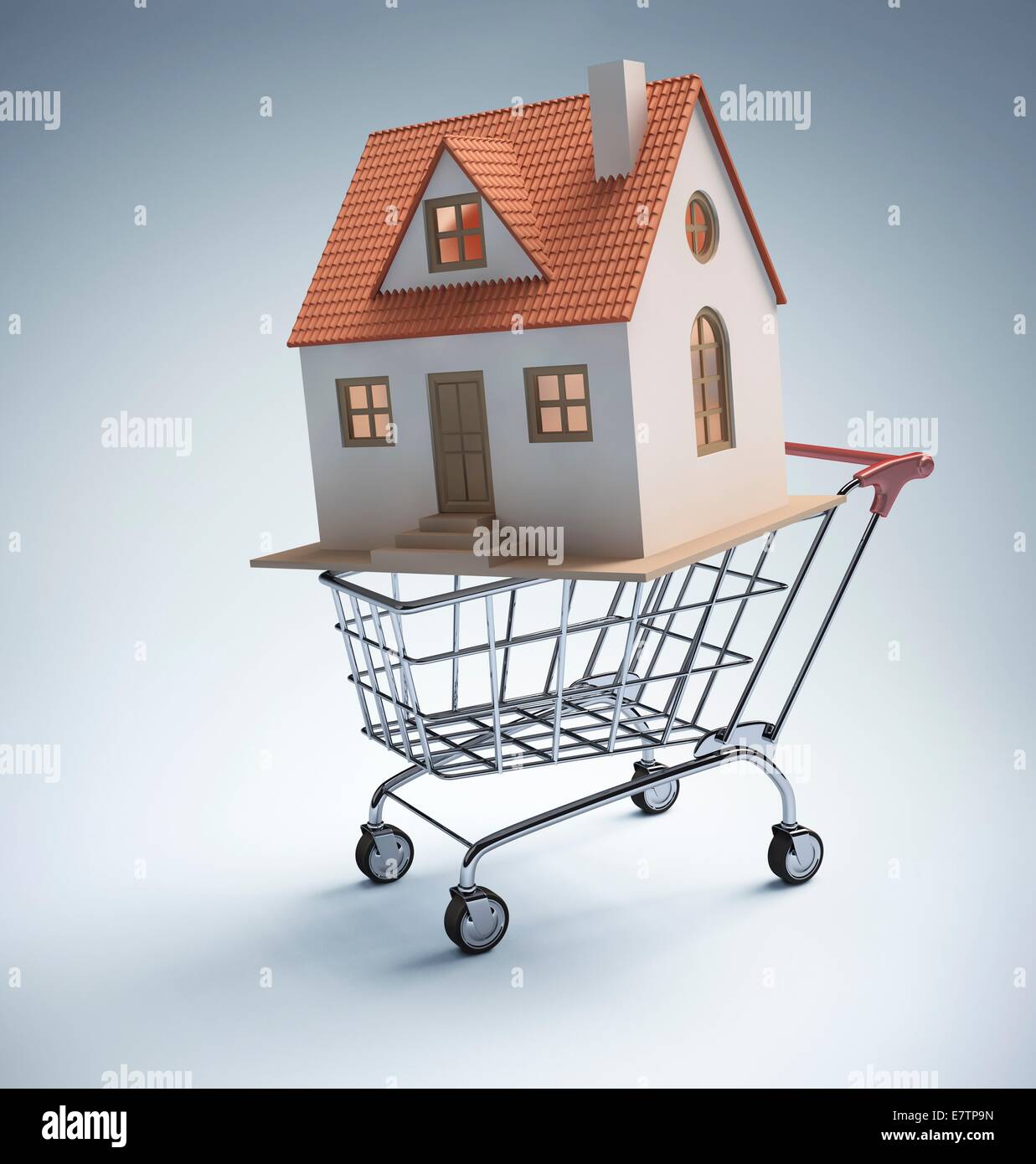 Model of a house in a shopping trolley, computer artwork. Stock Photo