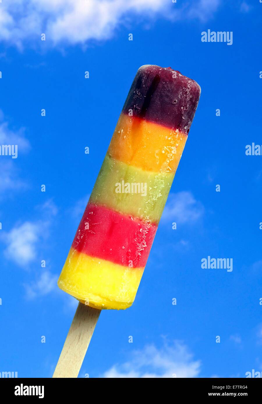Ice lolly against blue sky. Stock Photo