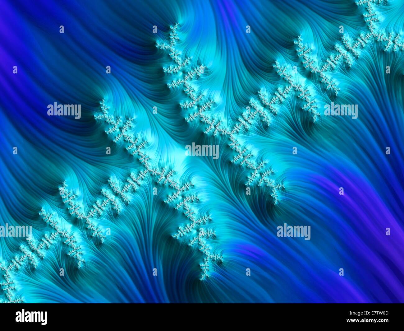 Julia fractal. Computer-generated dragon fractal derived from the Julia Set. Fractals are patterns that are formed by repeated subdivisions using some simple mathematical process. The large scale features of the pattern are repeated forever on an ever dec Stock Photo