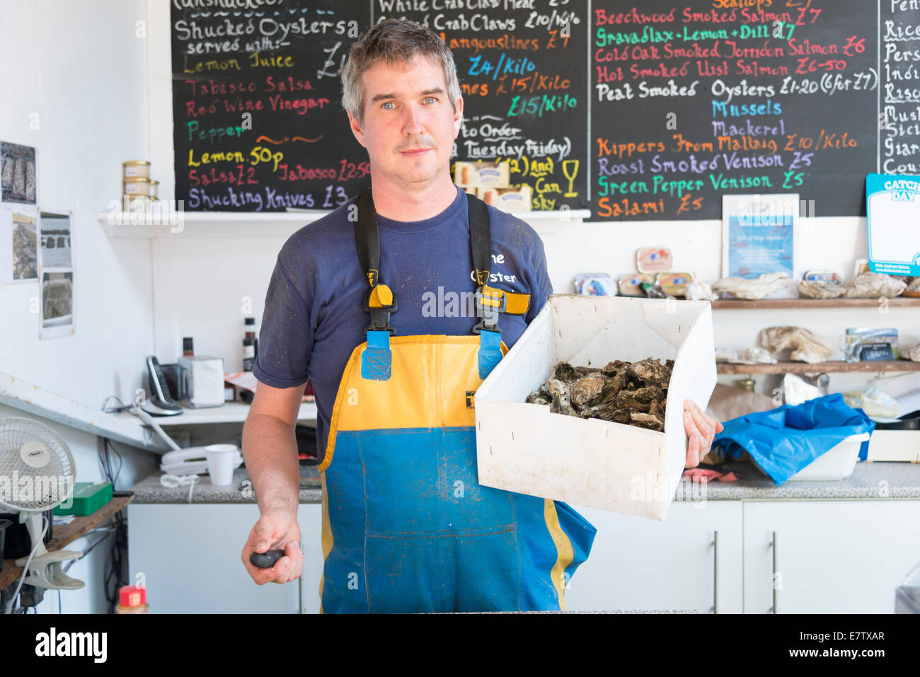 Paul McGlynn owner of the Oyster Shed oyster farm and seafood shop at Carbost Isle of Skye Scotland UK Stock Photo