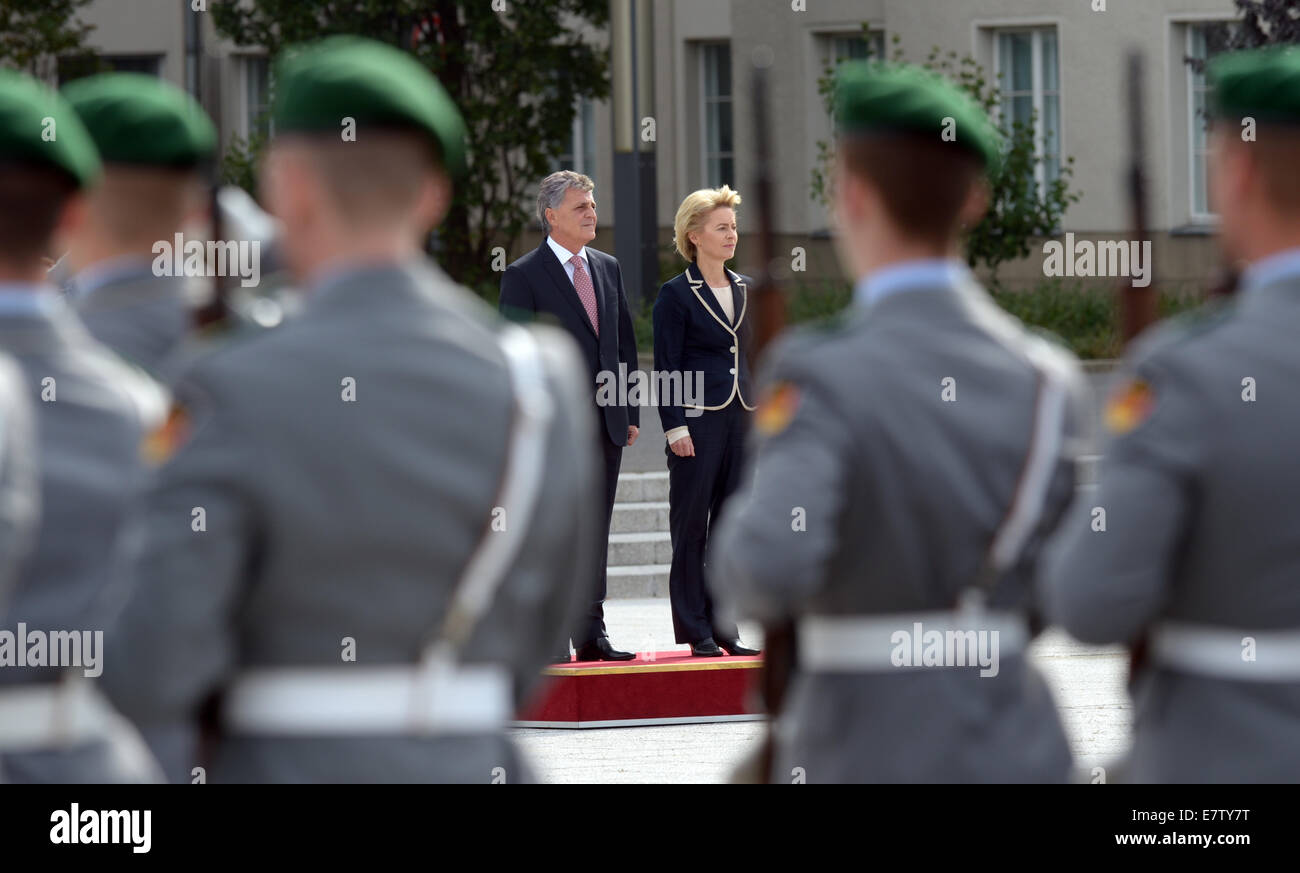 Berlin, Germany. 24th Sep, 2014. German Minister of Defence Ursula von der Leyen receives Romanian Minister of Defence Mircea Dusa with military honours at the Ministry of Defence in Berlin, Germany, 24 September 2014. Credit:  dpa picture alliance/Alamy Live News Stock Photo